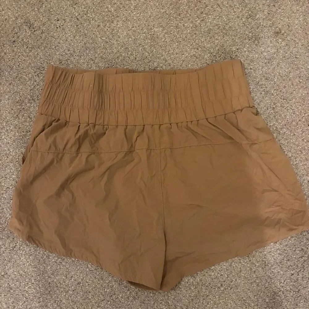 Source Unknown tan activewear